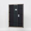 Efekt rama z litego drewna profil 25 orzech brąz 14,8x21 cm szkło muzealne